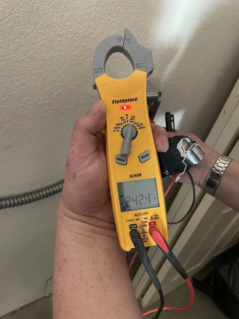 Voltage testing with clamp meter during Generator Installation in Silverton